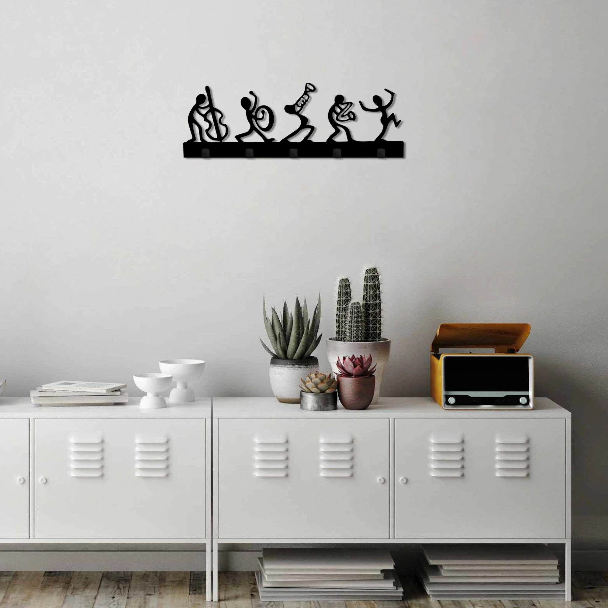 Varëse muri prej metali, motiv bendi muzikor, Wallity, e zezë