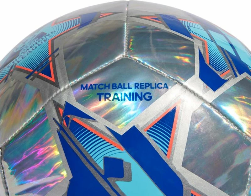Top futbolli adidas UCL Training 23/24, blu dhe argjendtë