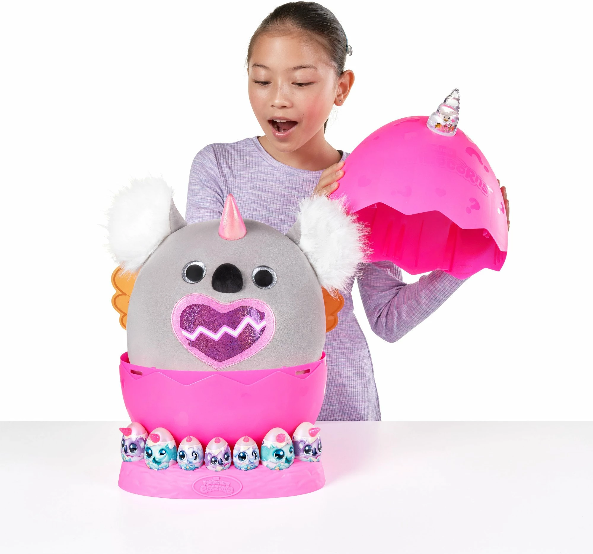 Lodër plush surprizë RAINBOCORNS Eggzania Fairy Mania S1, 50+ surpriza, model i rastësishëm, rozë/gri