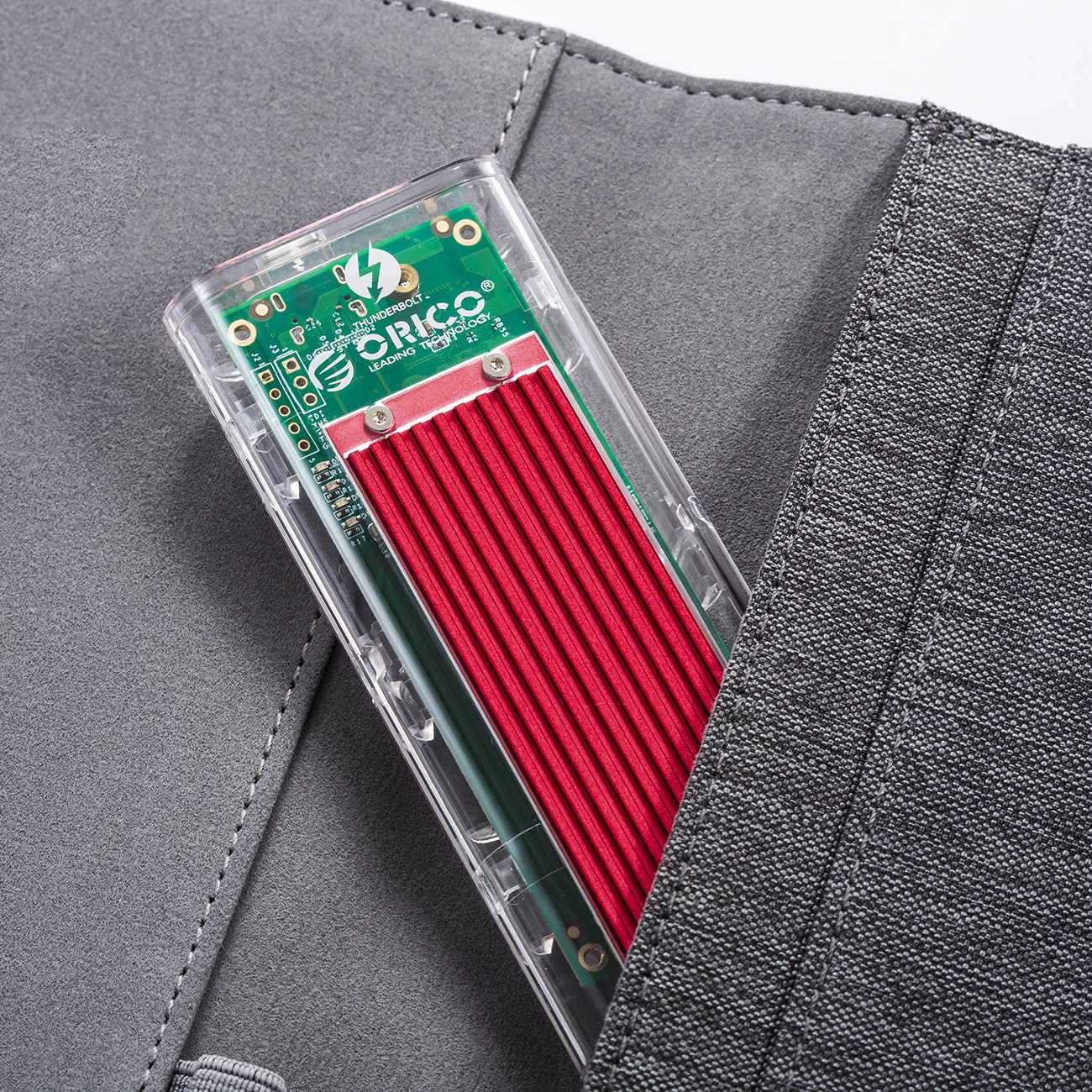 Kasë Orico TCM2-C3 për SSD M.2 NVMe në USB-C, 10Gb/s, Transparent/Kuqe