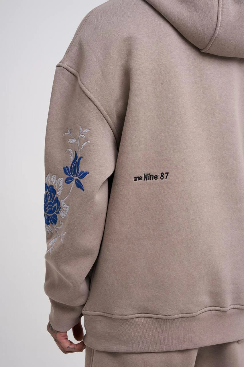 Duks oversize me kapelë dhe figurë Machinist, krem