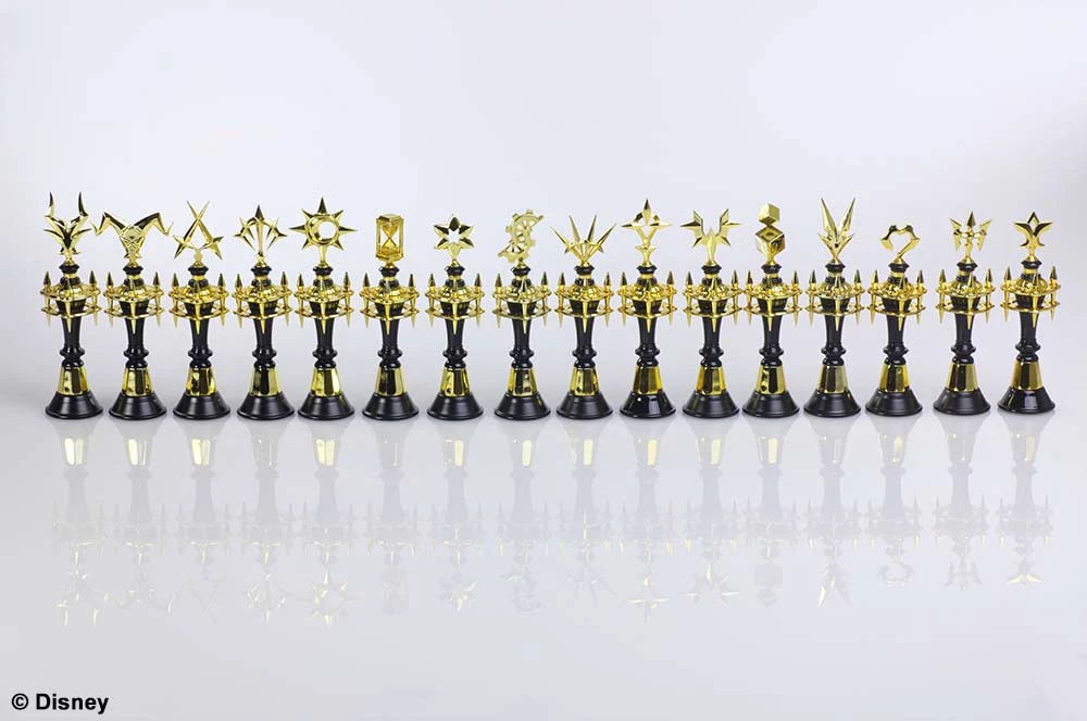 Set shah koleksionues Square Enix Kingdom Hearts III Alba & Ater, 32 figura metalike (16 ari + 16 argjendi) + tabelë