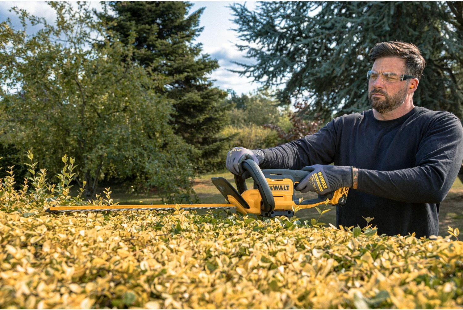 Gërshërë akumulatorike për gardh Dewalt DCMHT562P1 18V XR, 55 cm, 19 mm, set 1x 5Ah + karikues, verdhë/zezë
