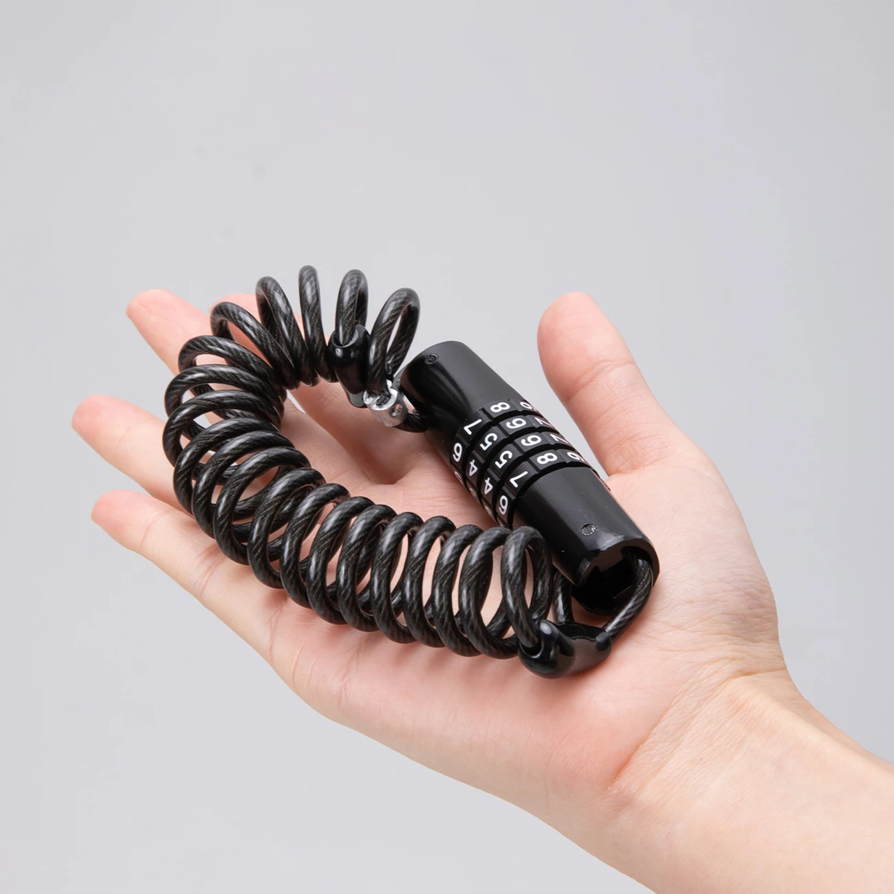 Kyç kabllo për biçikletë/helmetë Wozinsky WBN-01R, kombinim 4-shifror, 1.5 m, i papërshkueshëm nga uji, zi