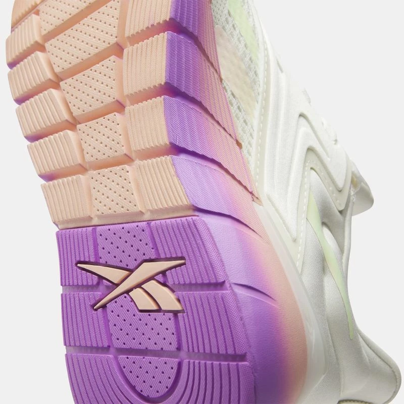 Atlete Reebok, të bardha dhe vjollcë