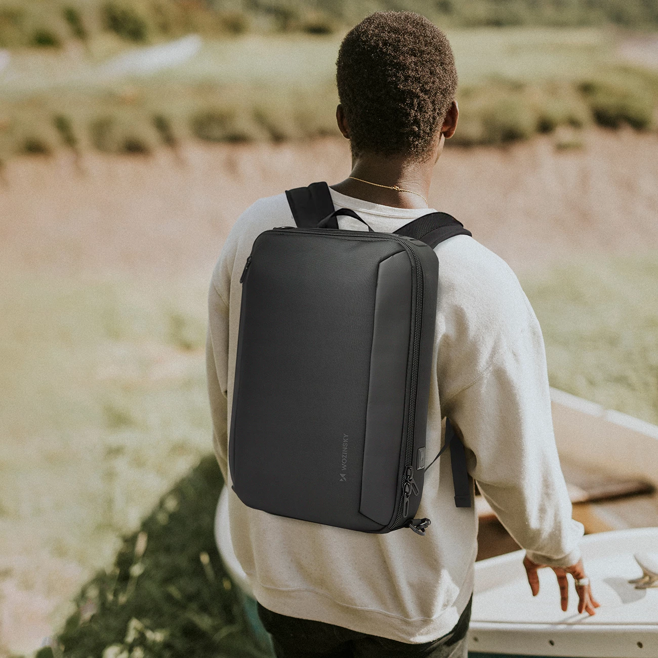 Çantë shpine/laptopi Wozinsky Premium 15.6 inç, me port USB, e zezë