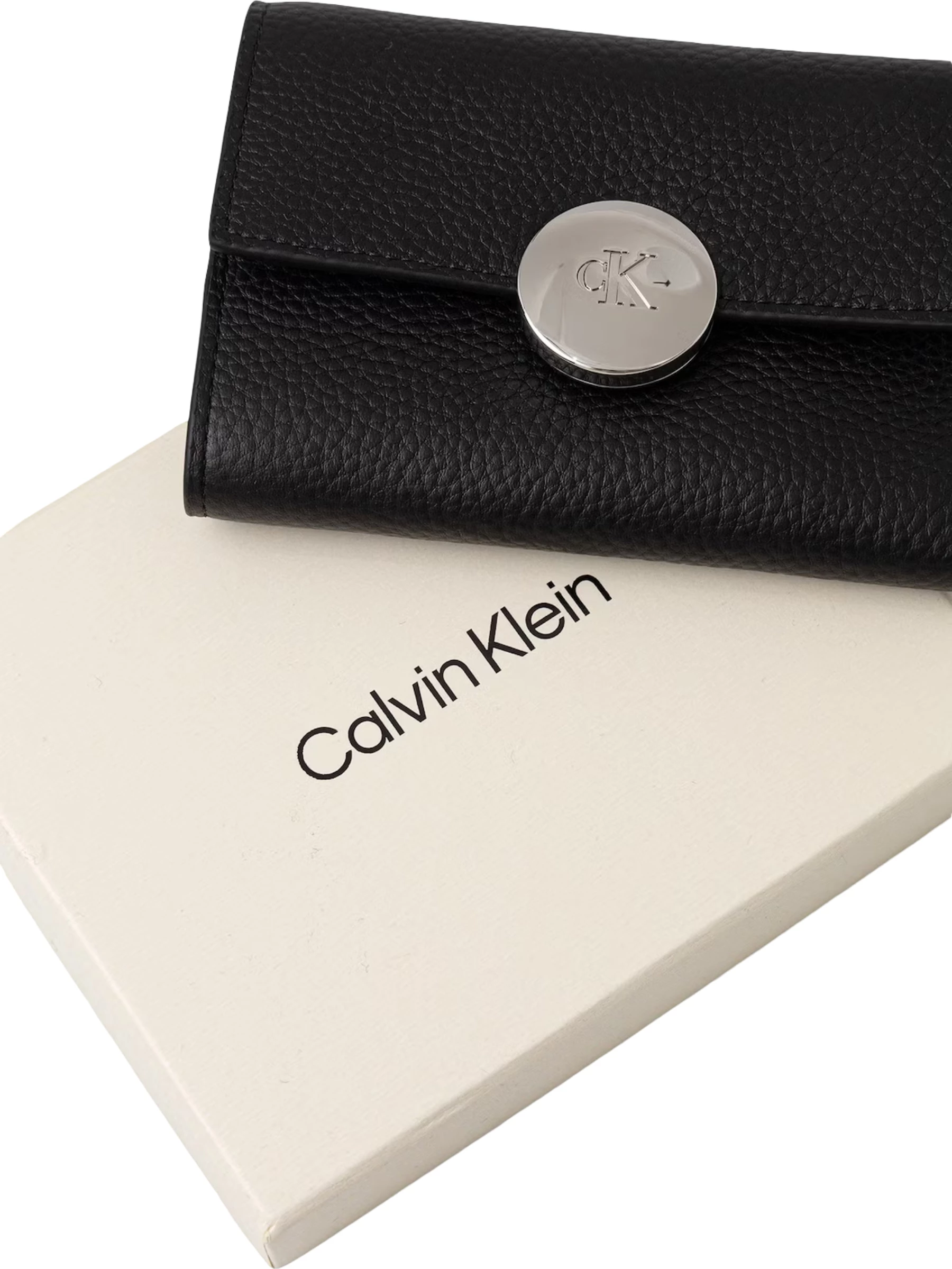 Portofol për femra Calvin Klein Round HW Pebble Trifold LV04F1225G, i zi