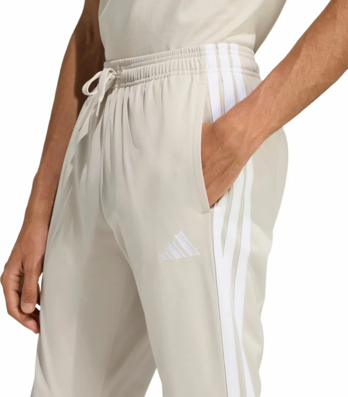 Pantallona meshkuj adidas 3-Stripes Tricot Regular Tapered JY7721, bezhë [Madhësia: L]