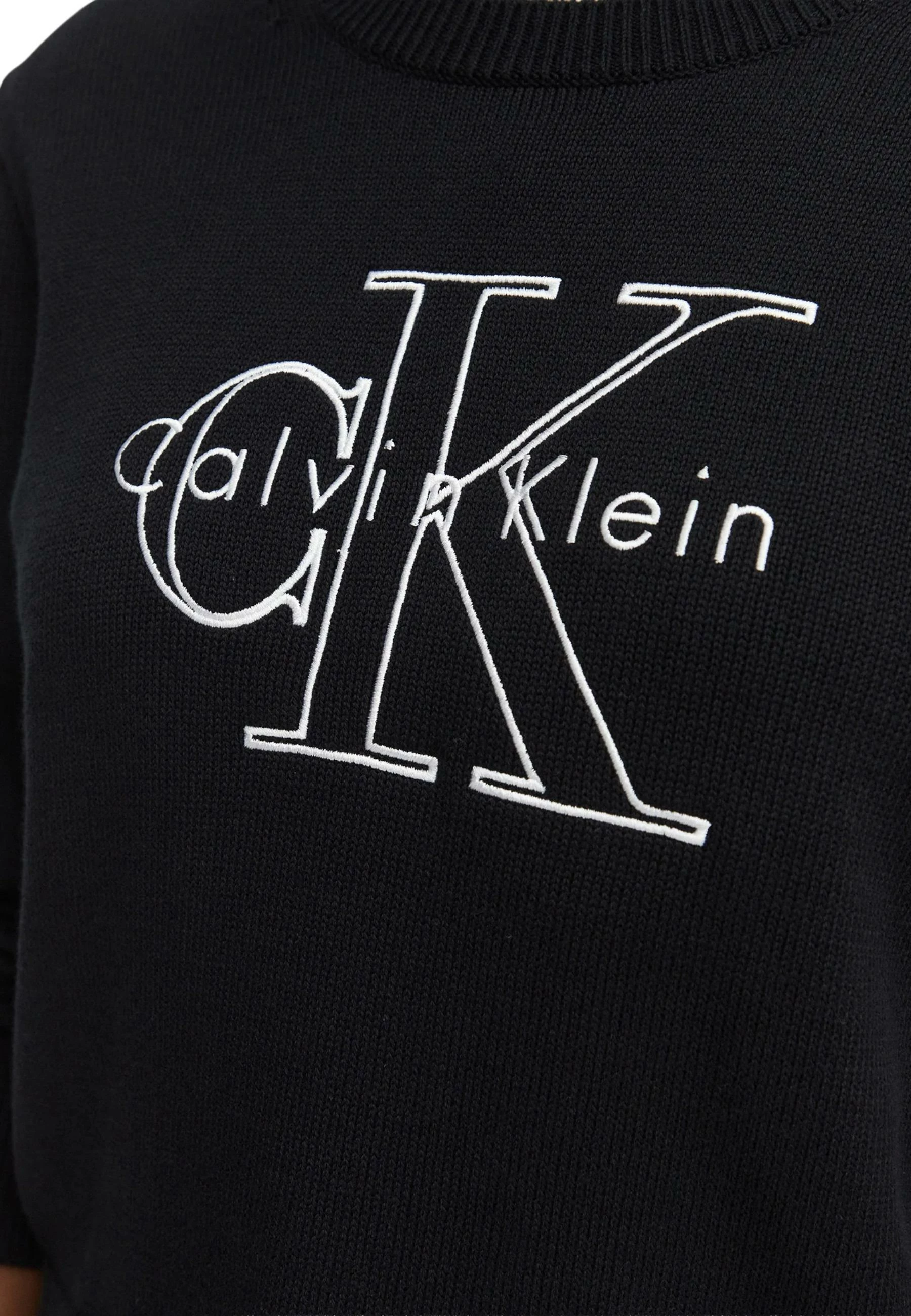 Xhemper për femra Calvin Klein Jeans LV047G322G, i zi [Madhësia: L]