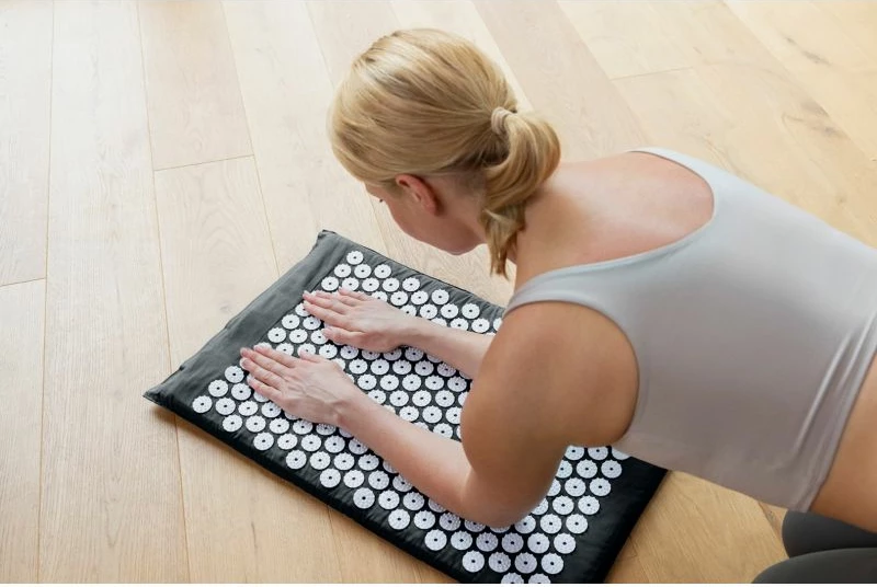 Tapet akupresure me ngrohje Medisana, e zezë