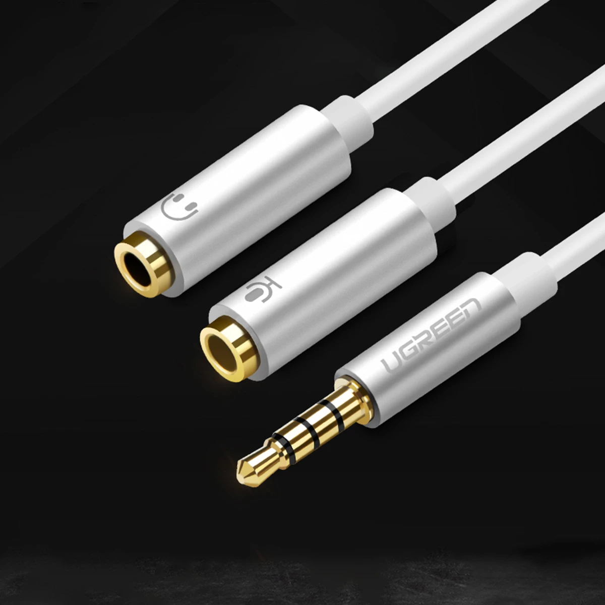 Kabllo ndarëse audio Ugreen AV141, 3.5 mm mini jack mashkull në 2 x 3.5 mm mini jack femër (mikrofon + audio), e zezë