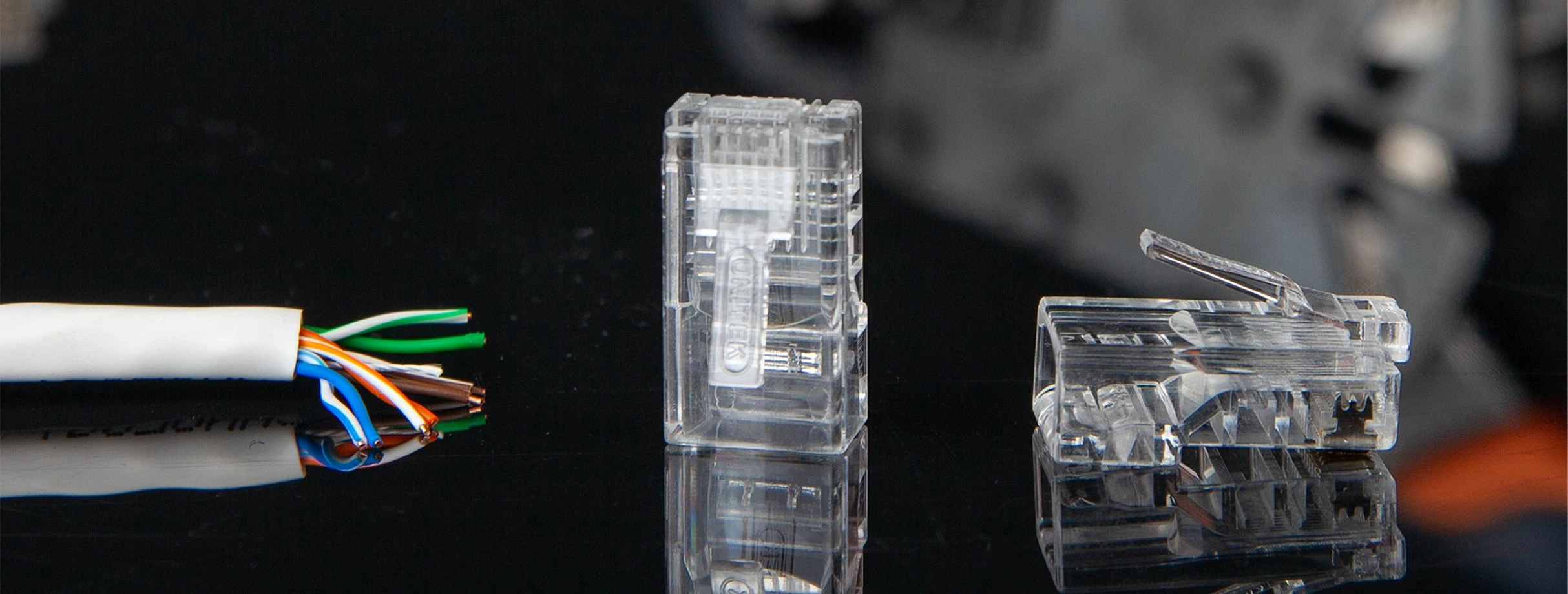 Konektor modular RJ45 Unitek Y-OT18TP Cat.5e, 100 copë, transparent