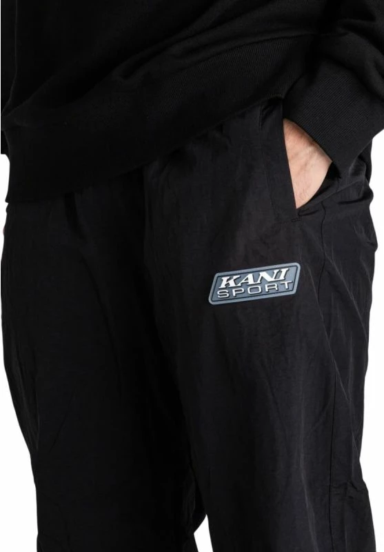 Pantallona sportive meshkuj Karl Kani SPORT PATCH ESSENTIAL TRACKPANTS, të zeza