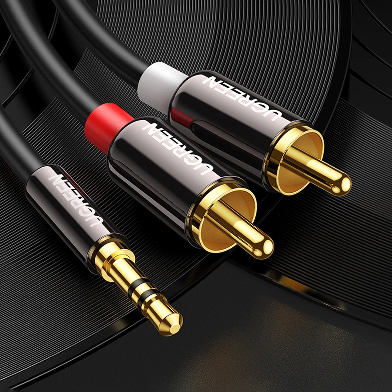 Kabllo audio Ugreen AV116 10584, mini jack 3.5mm në 2RCA, 2m, e zezë