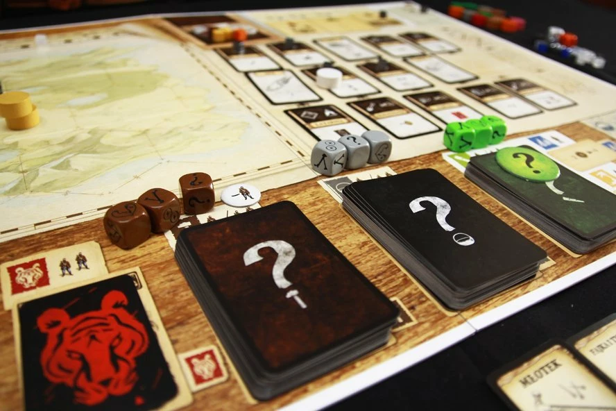 Lojë tavoline Portal Games Robinson Crusoe: Adventure on the Cursed Island, kooperative, 1-4 lojtarë, 120 min, 14+, version polonisht
