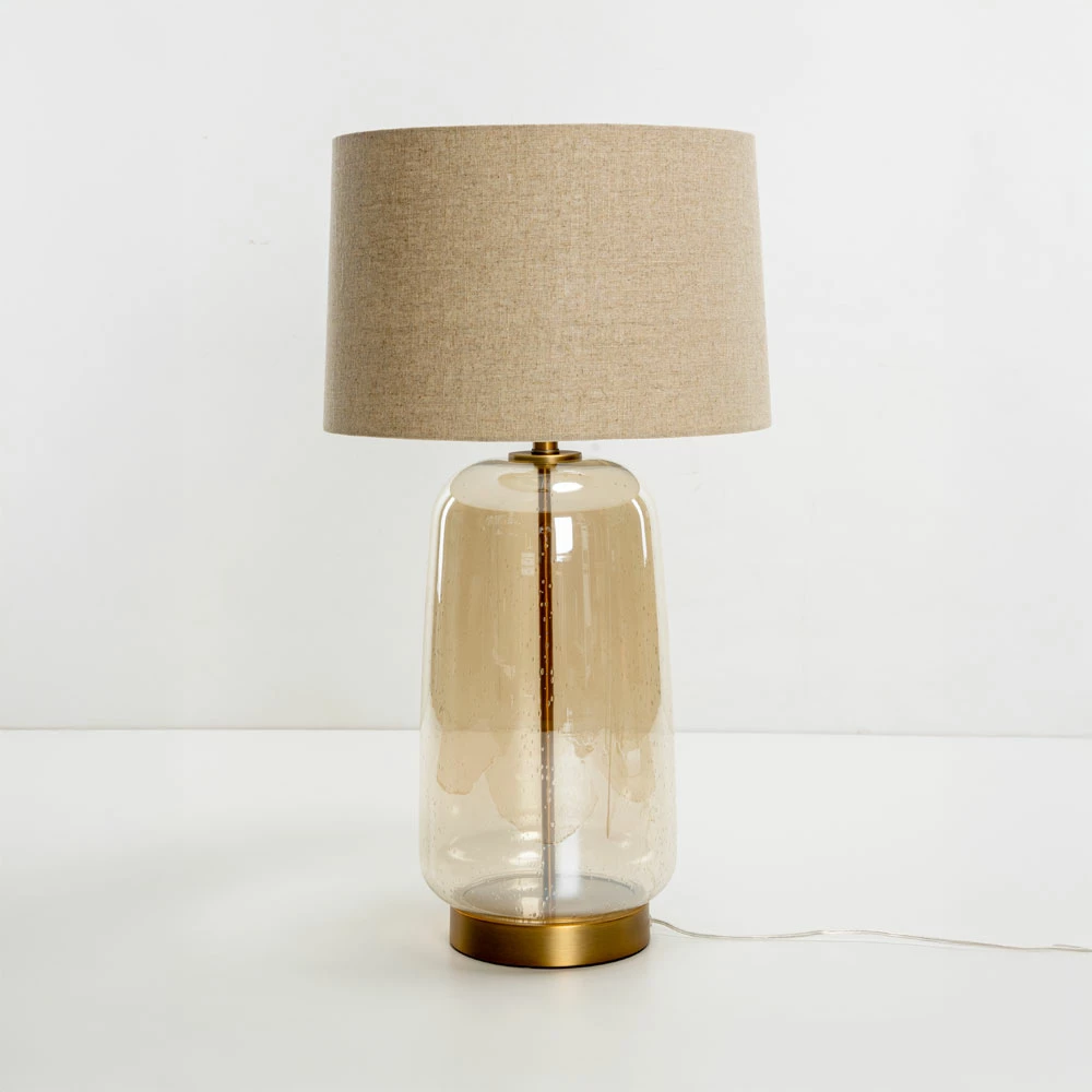 Llambë tavoline Bexley, xham, ngjyrë mjaltë-ari, abazhur lino bezhë, 43x43x79cm