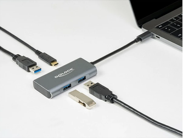 Hub USB-C DeLOCK, 4 porta (3x USB-A + 1x USB-C), USB 3.2 Gen 2 10Gbps, kabllo 0.12m, alumini, zi/gri