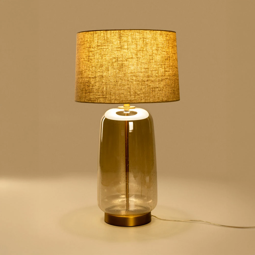 Llambë tavoline Bexley, xham, ngjyrë mjaltë-ari, abazhur lino bezhë, 43x43x79cm