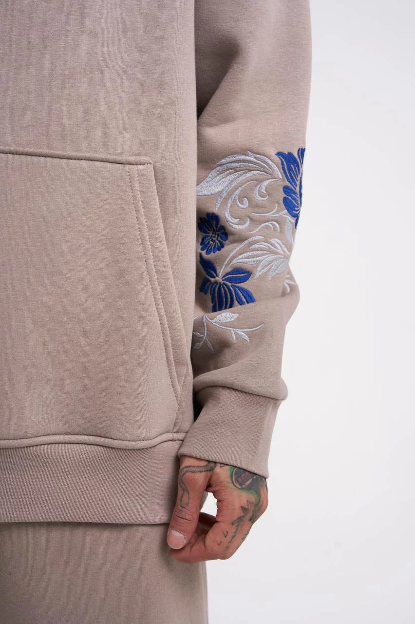 Duks oversize me kapelë dhe figurë Machinist, krem