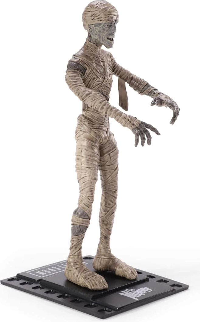 Figurinë NOBLE COLLECTION Bendyfigs Universal Monsters Mummy 19 cm me stendë, bezhë