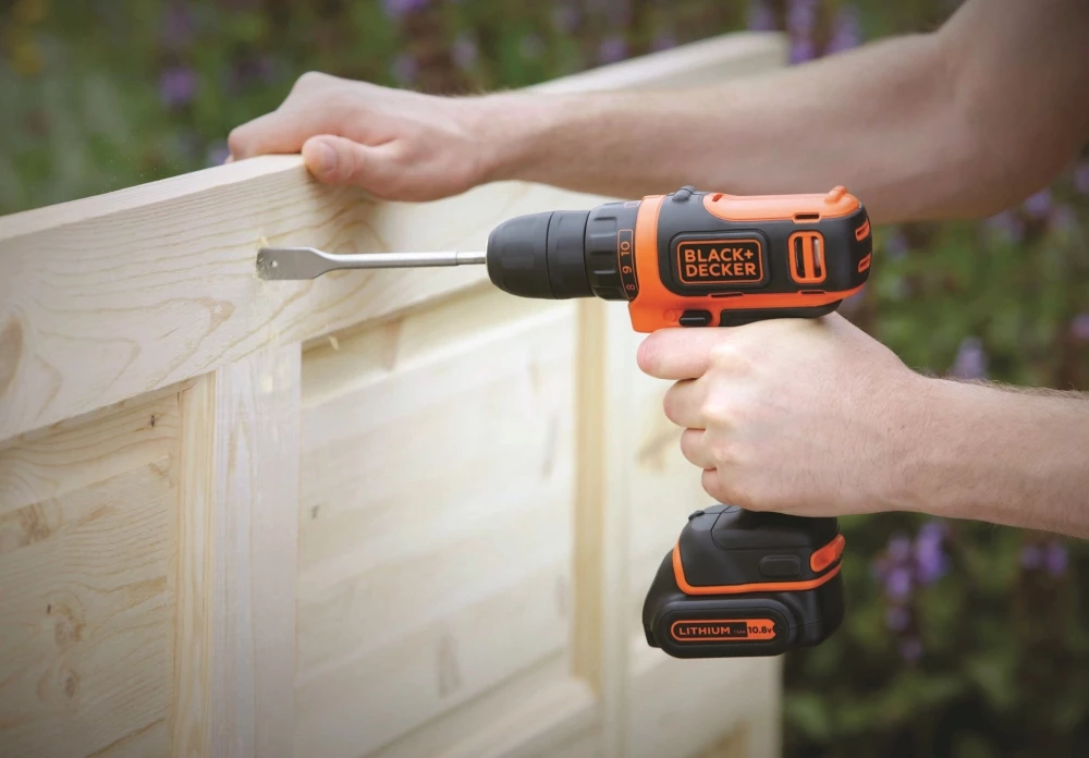 Aku shpuese/vidhosëse Black+Decker BDCDD12 10.8 V 1.5 Ah, me karikues, portokalli/zezë