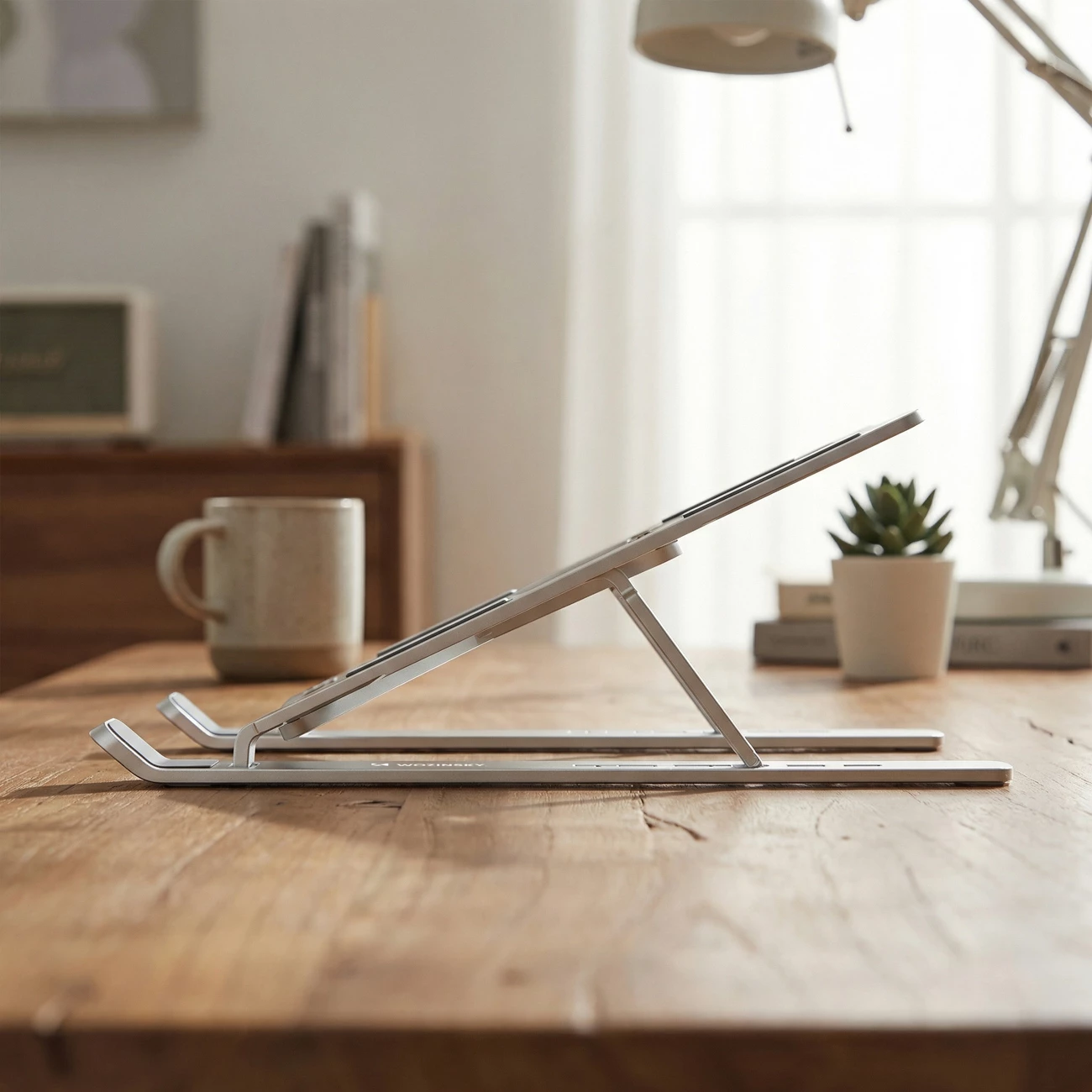 Mbajtëse laptopi Wozinsky WDCX-X8S, e palosshme, e rregullueshme 10-16\", 6 pozita, 10 kg, alumin, argjendtë