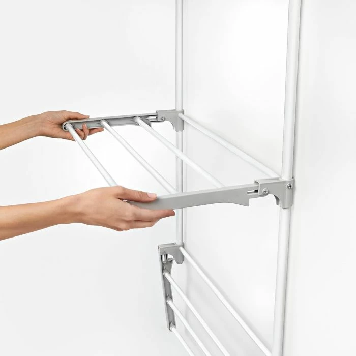 Tharëse rrobash e palosshme për derë dhe mur Rayen 033902, 8 m sipërfaqe tharjeje, 3 krahë, 62.5 x 32.7 x 124 cm, bardhë/gri, set me 2 grepa + vida