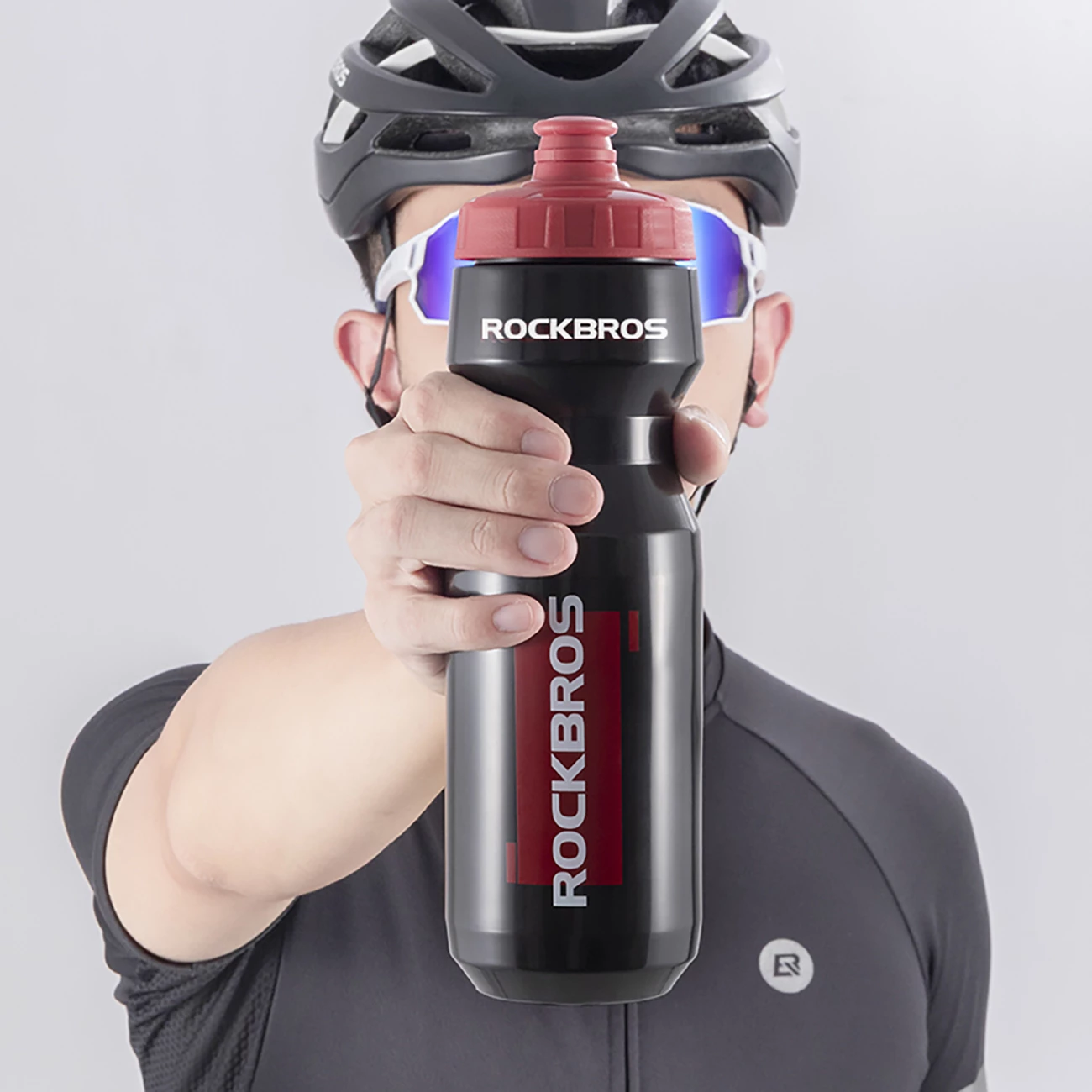 Shishe uji për biçikletë Rockbros Sports Bottle 750 ml, PP, me grykë silikoni, e zezë transparente me grykë të kuqe