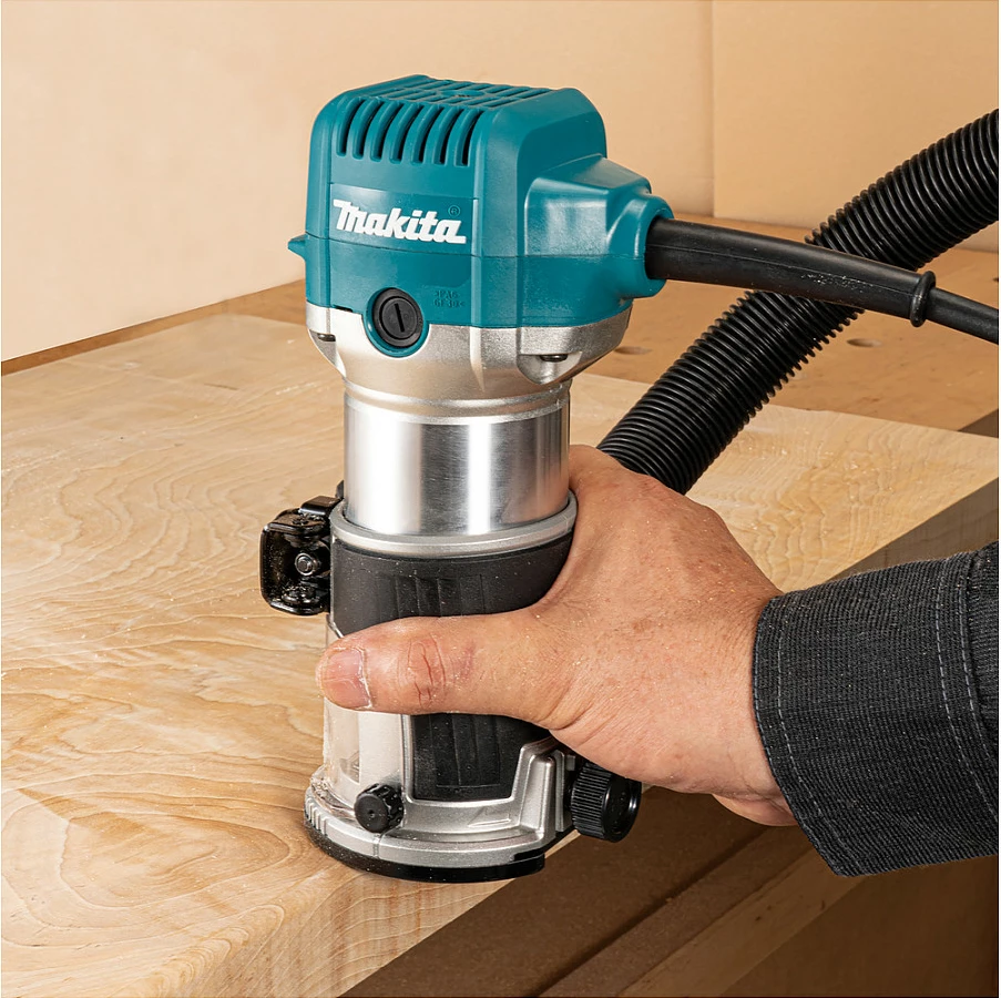 Frezë dore Makita RT0702C, 710W, 6/8 mm, 10000-34000 RPM, gjelbër/hiri