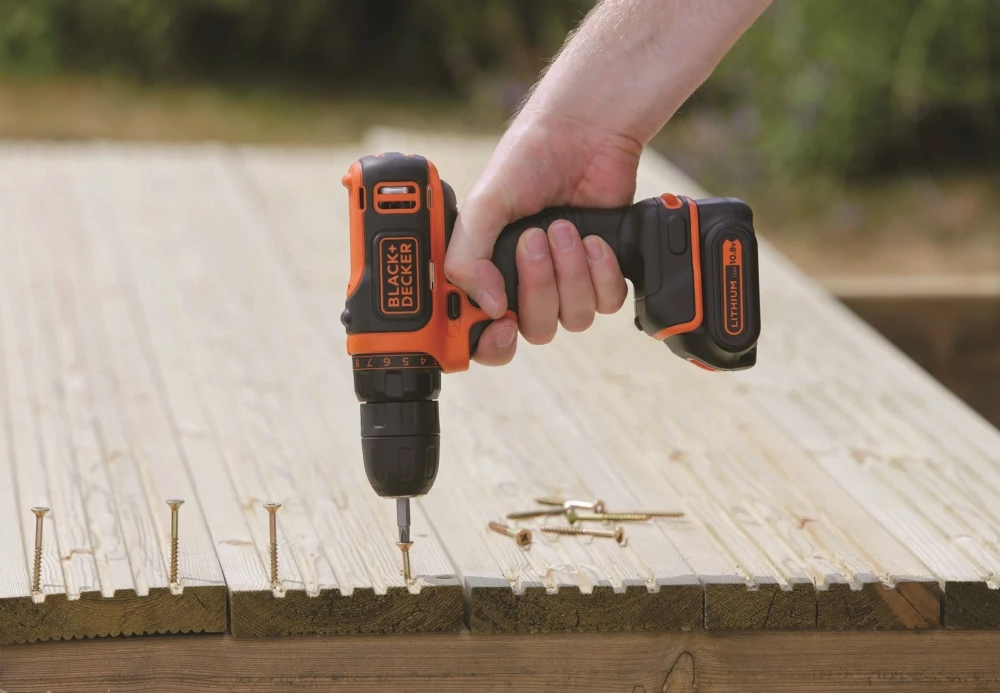 Aku shpuese/vidhosëse Black+Decker BDCDD12 10.8 V 1.5 Ah, me karikues, portokalli/zezë