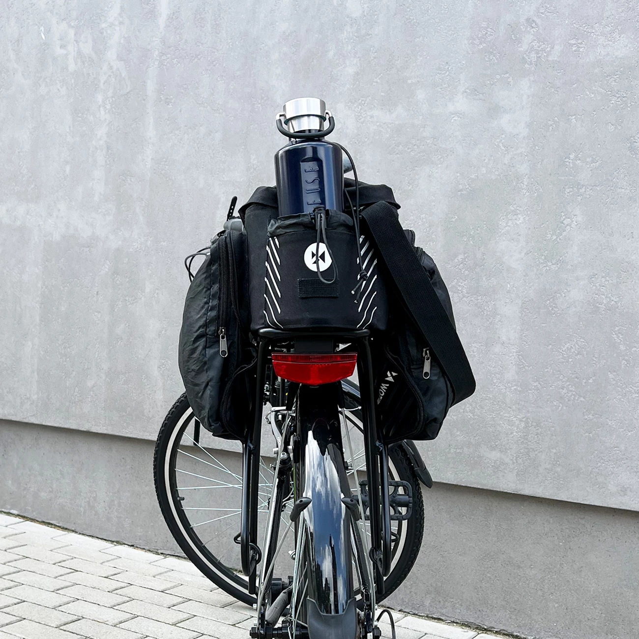 Çantë bagazhi për biçikletë Wozinsky WBB22BK, 9L, me rrip shpatulle, e zezë