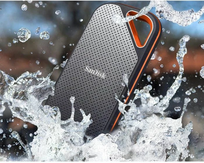 SSD ekstern SanDisk Extreme PRO SDSSDE81-4T00-G25 4TB NVMe USB-C 3.2 Gen 2x2 i rezistent, zi/portokalli, set me 2 kabllo