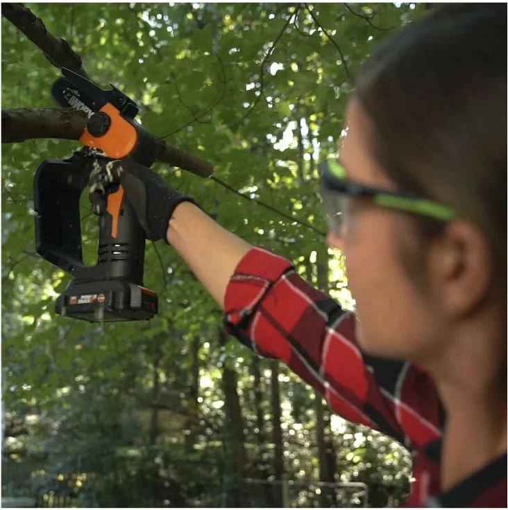 Sharrë zinxhir kompakte pa kabllo Worx WG324E 20V, zezë/portokalli, me bateri dhe karikues