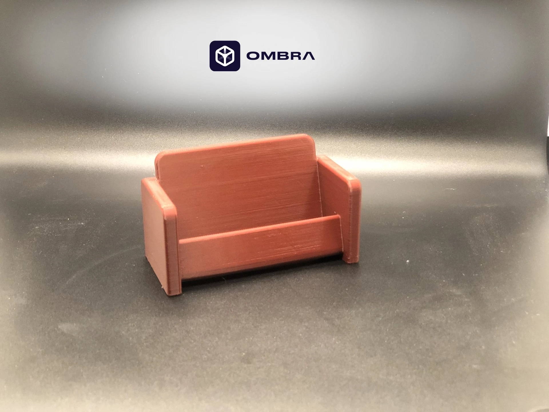 Mbajtëse për vizitëkarta në formë kolltuku, e portokalltë