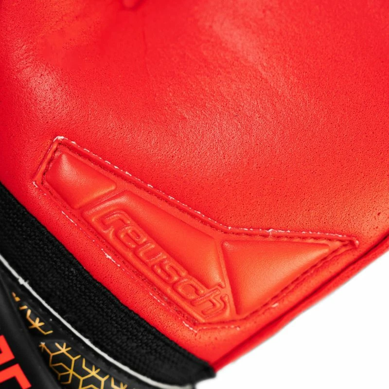 Dorëza portieri për fëmijë Reusch, të zeza dhe të kuqe