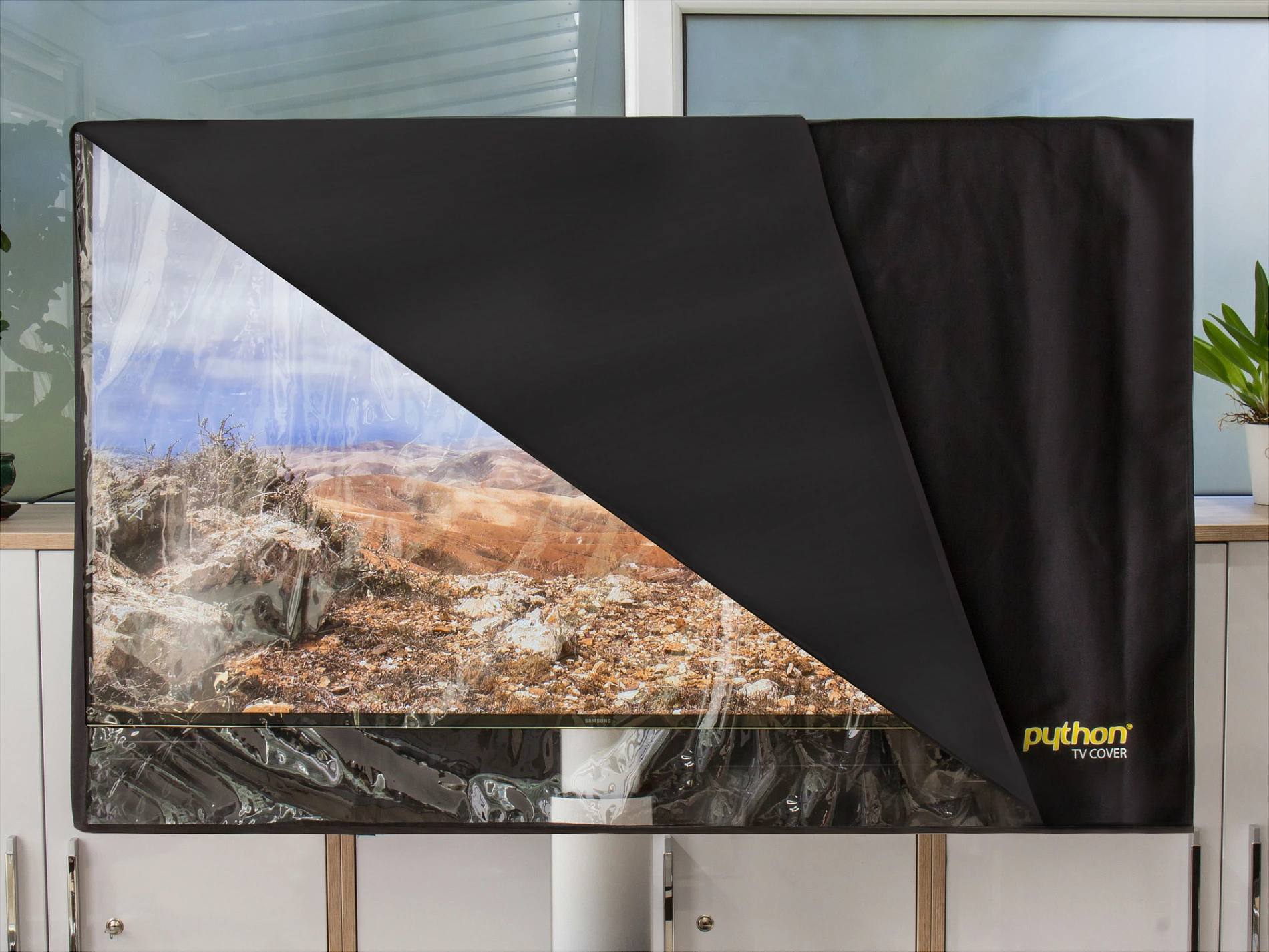 Mbështjellës për TV Python TV-Cover 78x48cm, për 28"-32", i papërshkueshëm nga uji, zi/transparent