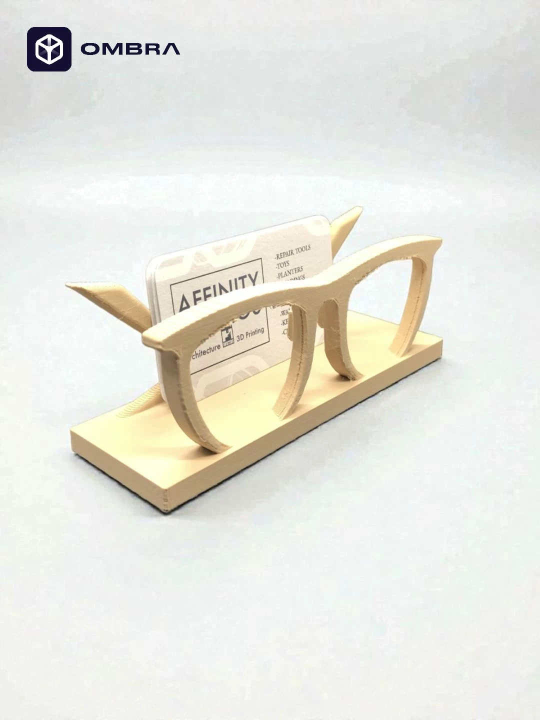 Mbajtëse për vizitëkarta në formë Syze, krem