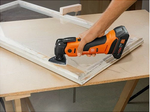 Vegël multifunksionale osciluese Fein Multimaster AMM 700 MAX TOP AS, 18V, me bateri dhe valixhe, portokalli