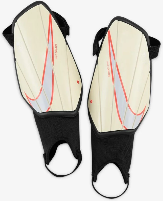 Mbrojtëse për këmbë për meshkuj Nike Charge, të bardha