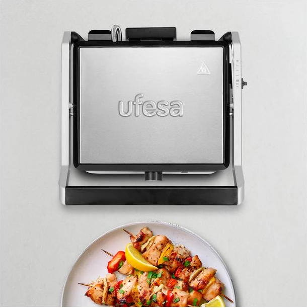 grill elektrik kontaktues UFESA Press Grill Jaya 2000 2000 W, hapje 180°, pllaka 29×24.5 cm, anti-ngjitëse, zi/argjend