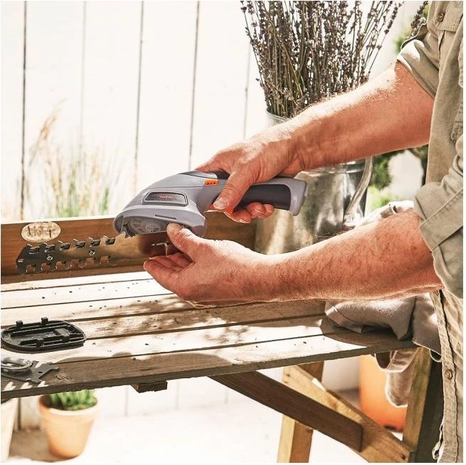 Trimmer pa kabllo 2-në-1 VONHAUS 2500259, 3.6V Li-ion, teh 10 cm + gërshërë bari 7 cm, adaptor UK/EU, gri/zi/portokalli