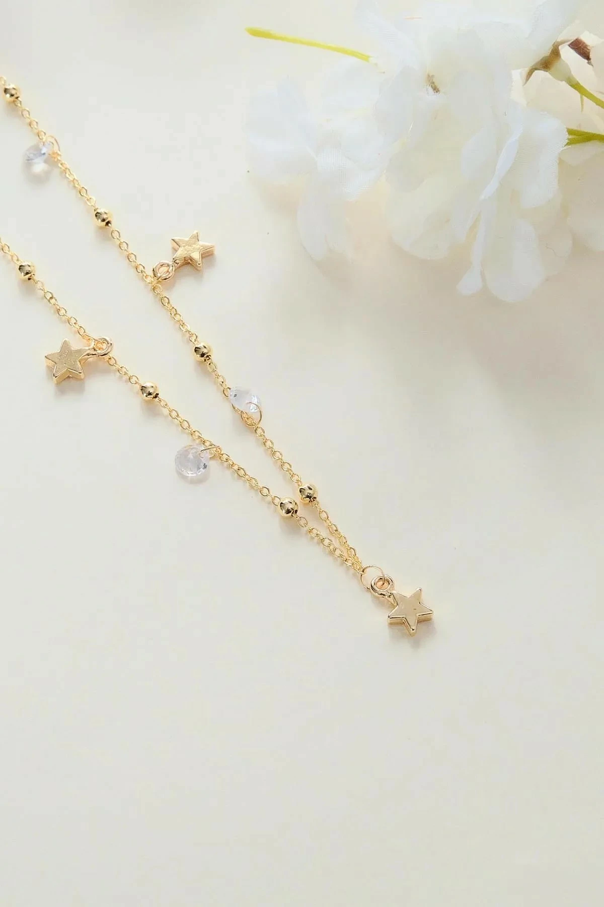 Varëse qafe Jumeon, ngjyrë ari, me gurë zirkon, Gld-Yldzrknkl