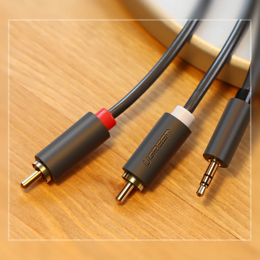 Kabllo audio Ugreen AV102 10511, 1.5m, mini jack 3.5mm në 2RCA, Gri
