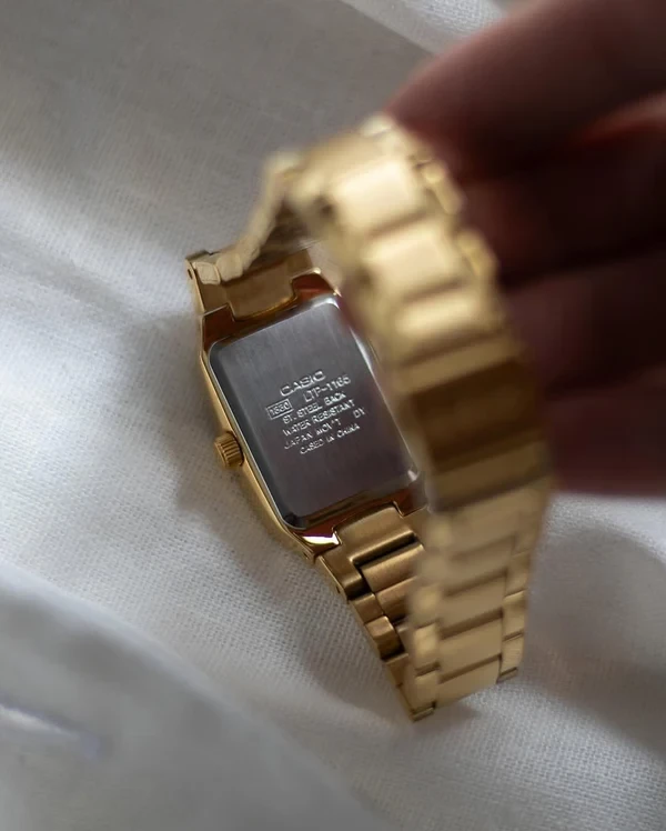 Orë dore Casio LTP-1165N-1C,e artë/zezë