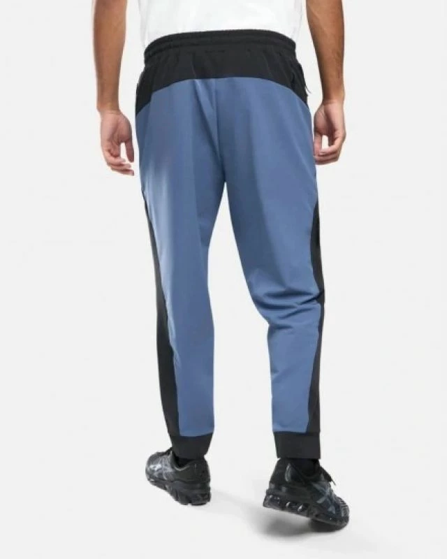 Pantallona sportive meshkuj Puma Tech Woven, kaltër [Madhësia: XS]