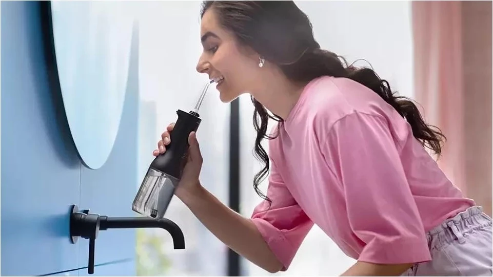 Irigator oral Philips Sonicare HX3826/33, me bateri, Black, set me çantë udhëtimi + 2 gryka